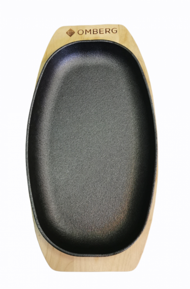 Gusseisenpfanne oval mit Holzunterlage